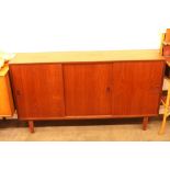 A teak G plan design low cabinet, fitted interior