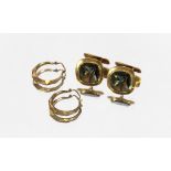 A pair of 14ct gold and smoky quartz cuff-links; a