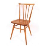 A set of six light Ercol stick back dining chairs