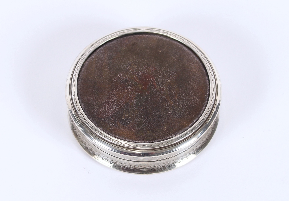 A white metal and shagreen compact, the lid decorat