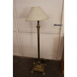 A brass Corinthian column standard lamp