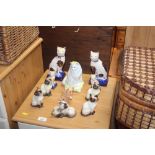 A quantity of cat ornaments to include Beswick, Do