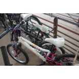 A girl's Apollo full suspension mountain bike