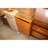 A two drawer filing chest; together with a beech e