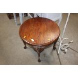 An oak circular topped table