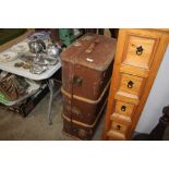 A wooden bound travelling trunk