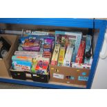 Two boxes of various games and puzzles