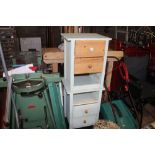 A pair of bedside chests fitted two drawers - each