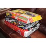 Three boxes of various Scalextric