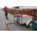 A single axle car trailer with spare wheel and axl