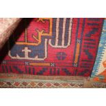 An approx. 4'7" x 2'10" Balouchi rug