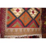 An approx. 2'10" x 2' Memana Kelim rug