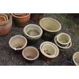 A quantity of glazed planters