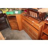 A teak cupboard fitted two drawers; together with