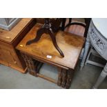 An oak nest of three occasional tables