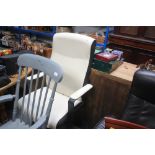 A leatherette upholstered swivel office chair