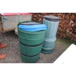 A compost bin and two water butts