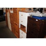 A pair of pine bedside chests fitted two drawers