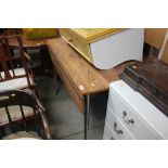 A melamine drop leaf kitchen table