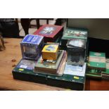 A quantity of jigsaw puzzles, books etc.