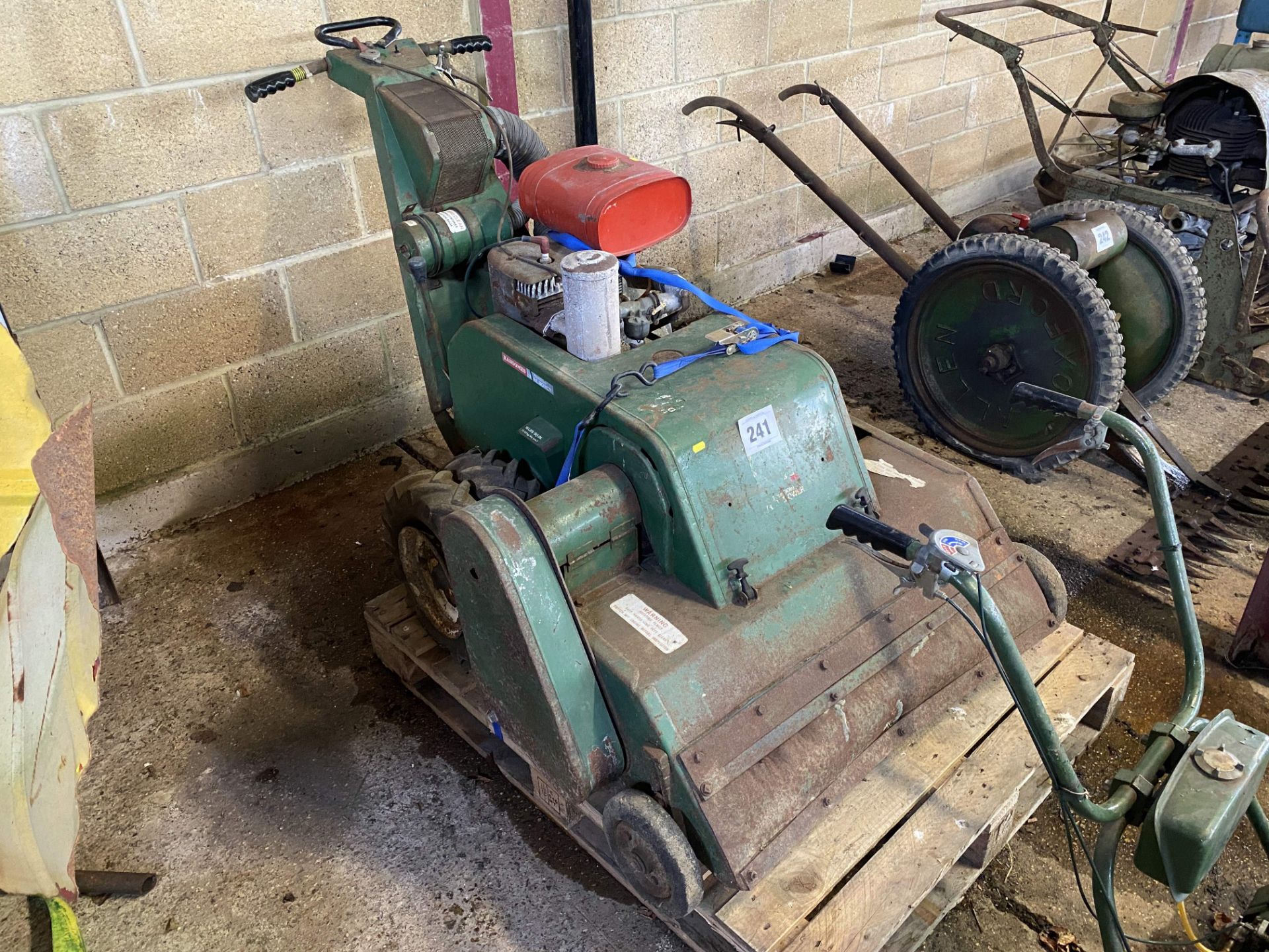 Ransomes 76cm pedestrian flail mower. With Mag single cylinder petrol engine. *