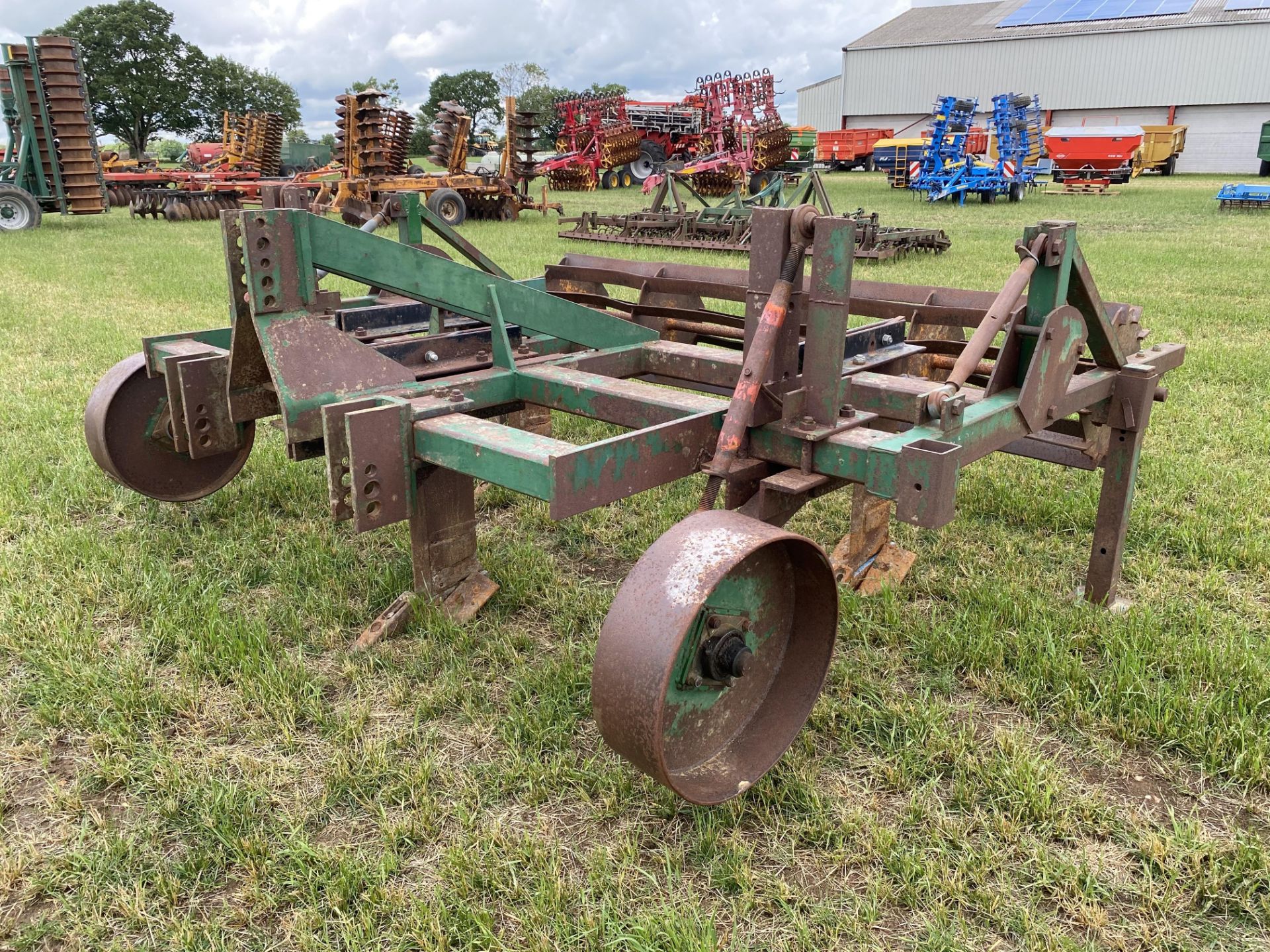 Cousins three leg subsoiler. With cage crumbler and depth wheels. LV