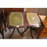 A pair of mahogany occasional tables with leather