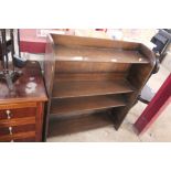 An oak open fronted bookcase