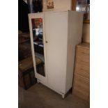 A grey painted G-plan wardrobe