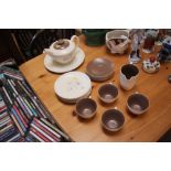 A quantity of Poole pottery twin tone teaware