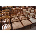 A set of six mahogany rail back dining chairs