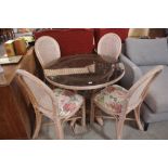 A wicker patio set, comprising circular table and