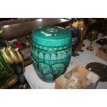 A Chinese green glazed pottery barrel garden seat