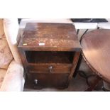 A 1930's oak bedside cabinet