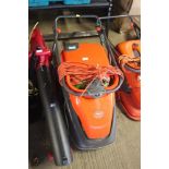 A Flymo electric lawnmower