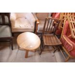 A light oak circular 1930's coffee table; and an a