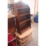 A mahogany open fronted bookcase