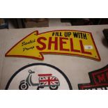 A cast iron "Fill Up With Shell" sign