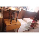 An oak barley twist folding table; a Formica drop