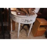 A grey painted demi-lune hall table