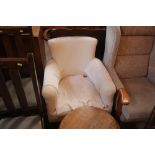 An Edwardian tub shaped nursing chair