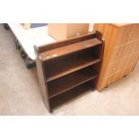 A mahogany open fronted bookcase