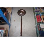 A Victorian copper warming pan