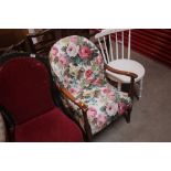 A 1930's armchair with floral upholstery