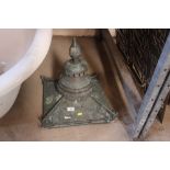 An antique copper street lantern top