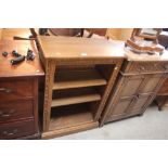 An Ercol open fronted bookcase