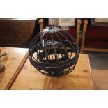 Three metalware spherical candle cages