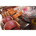 A set of four mahogany bar back dining chairs with