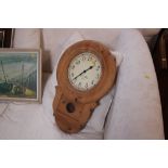 A stripped pine cased kitchen wall clock