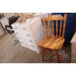 A pine spindle back dining chair; and a white ches